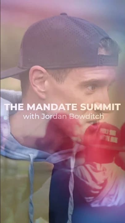 Marky MARKskie wearing a backwards cap during his Mandate Summit testimonial